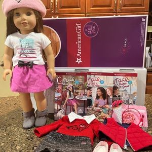 American Girl doll - Grace with lots of outfits and accessories.